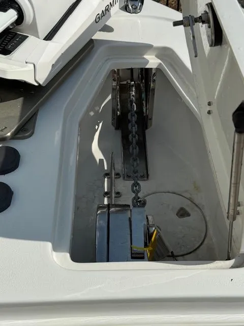 Slide: The Image of Anchor locker of Sea Hunt Ultra 265 SE 2025 with chain. - 13