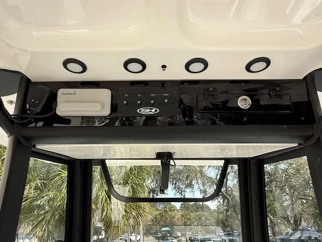 Slide: The Image of Interior view of 2025 Sea Hunt Ultra 265 SE with electronics. - 16