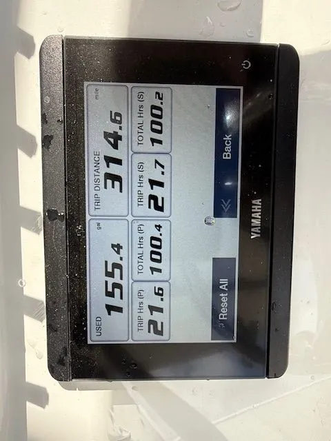 Slide: The Image of Yamaha display on Sea Hunt Ultra 265 SE, showing fuel and trip data. - 18