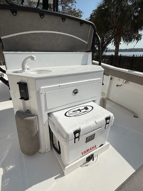 Slide: The Image of 2025 Sea Hunt Ultra 265 SE with Yamaha cooler and sink. - 7