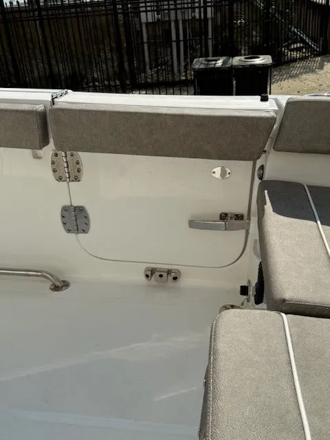 Slide: The Image of Interior view of a 2025 Sea Hunt Ultra 265 SE boat. - 8