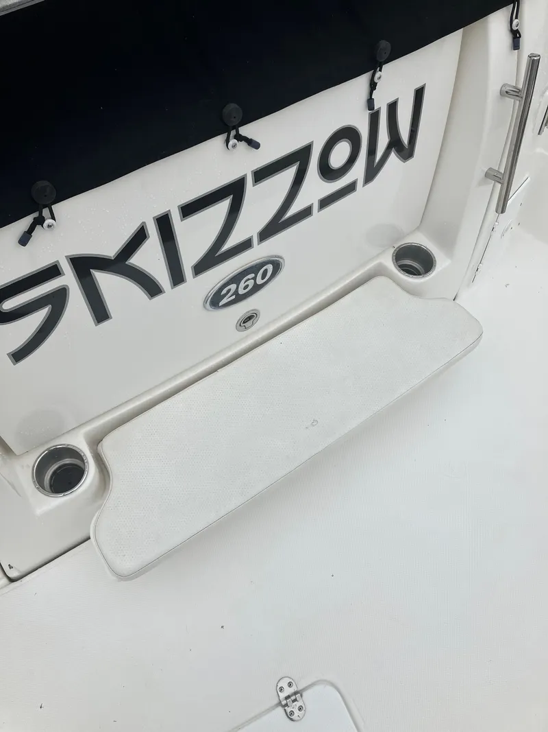 Slide: The Image of Rinker 260 Express Cruiser 2008 boat rear with lettering. - 12
