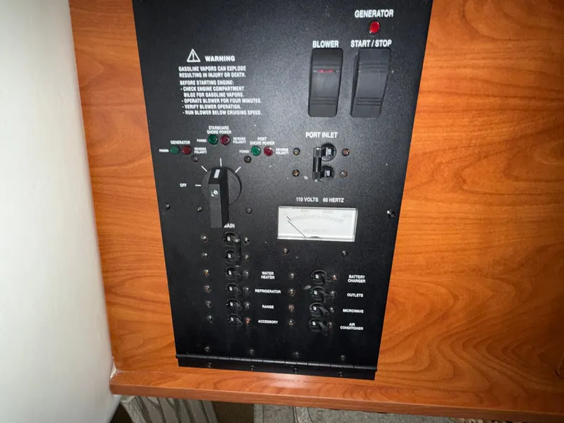 Slide: The Image of Control panel of a 2008 Rinker 260 Express Cruiser. - 15