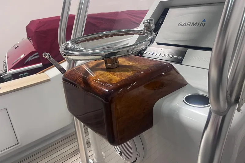 Slide: The Image of Steering console of 2017 Harrison Boatworks 28 Center Console with Garmin navigation system. - 20