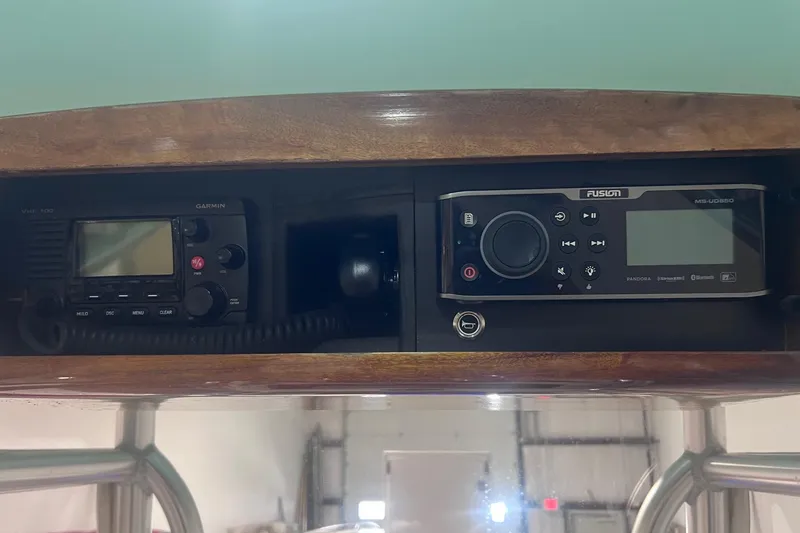 Slide: The Image of 2017 Harrison Boatworks 28 Center Console dashboard with Garmin and Fusion electronics. - 21