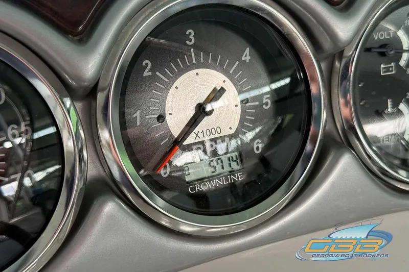 Slide: The Image of Close-up of 2009 Crownline 300 LS boat tachometer, showing RPM gauge and digital display. - 31