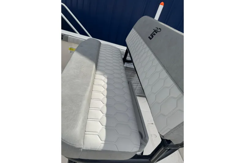 Slide: The Image of 2026 Carolina Skiff 21 LS boat seat with hexagonal pattern upholstery. - 7