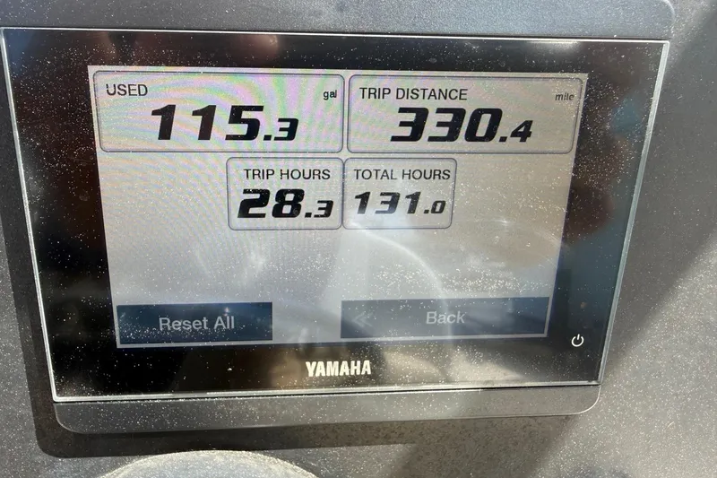 Slide: The Image of Yamaha display showing fuel usage and trip data for 2023 Robalo 246 Cayman SD. - 6