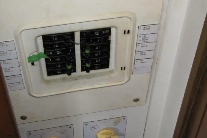 Slide: The Image of Electrical panel on a 1973 Chris-Craft 55 Commander boat. - 23