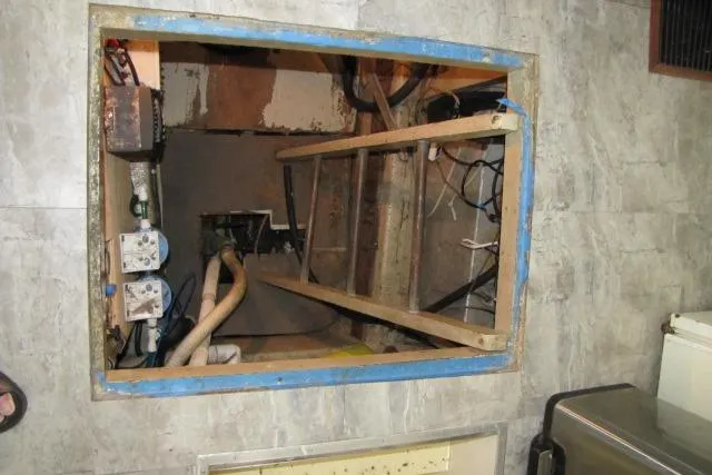 Slide: The Image of Access hatch with ladder in 1973 Chris-Craft 55 Commander yacht interior. - 72