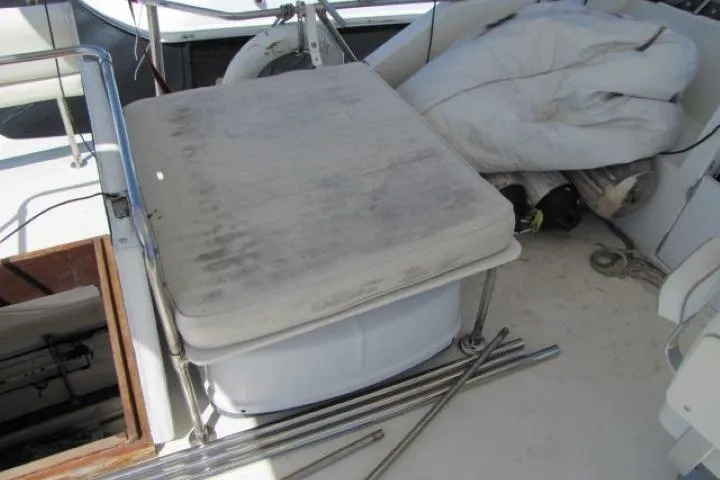 Slide: The Image of 1973 Chris-Craft 55 Commander deck with seating and stored equipment. - 9