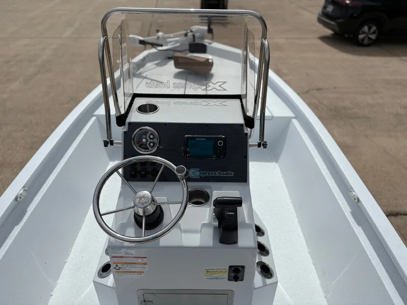 Slide: The Image of Xpress H210B Hyper-Lift Bay 2026 boat console with controls. - 3