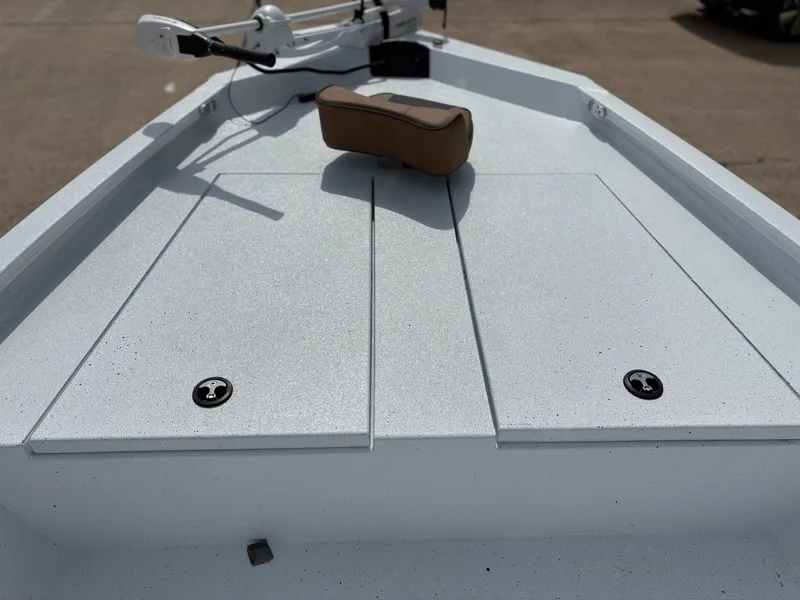 Slide: The Image of Xpress H210B boat deck with storage and seat, model 2026. - 5