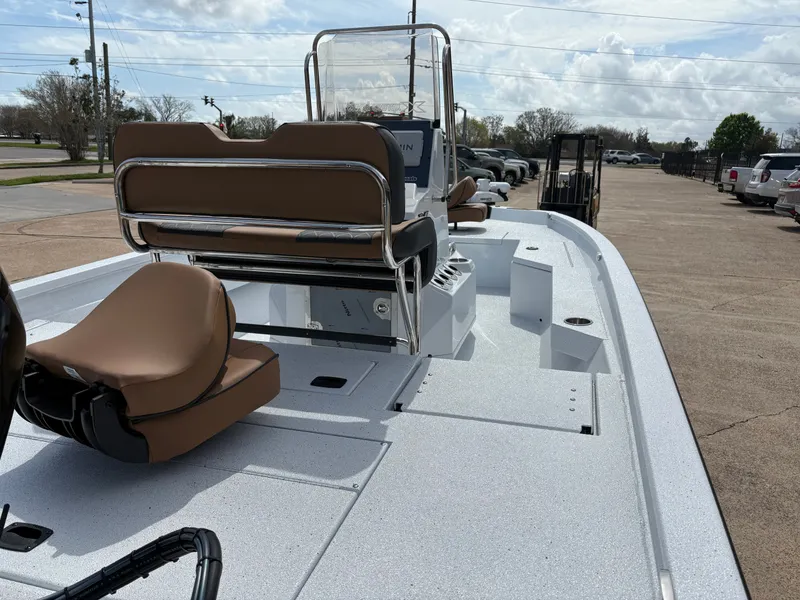 Slide: The Image of 2026 Xpress H20B Hyper-Lift Bay boat with brown seats. - 3