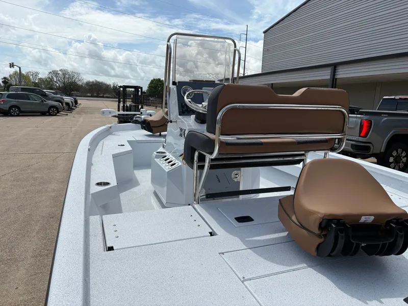 Slide: The Image of 2026 Xpress H20B Hyper-Lift Bay boat on parking lot. - 4