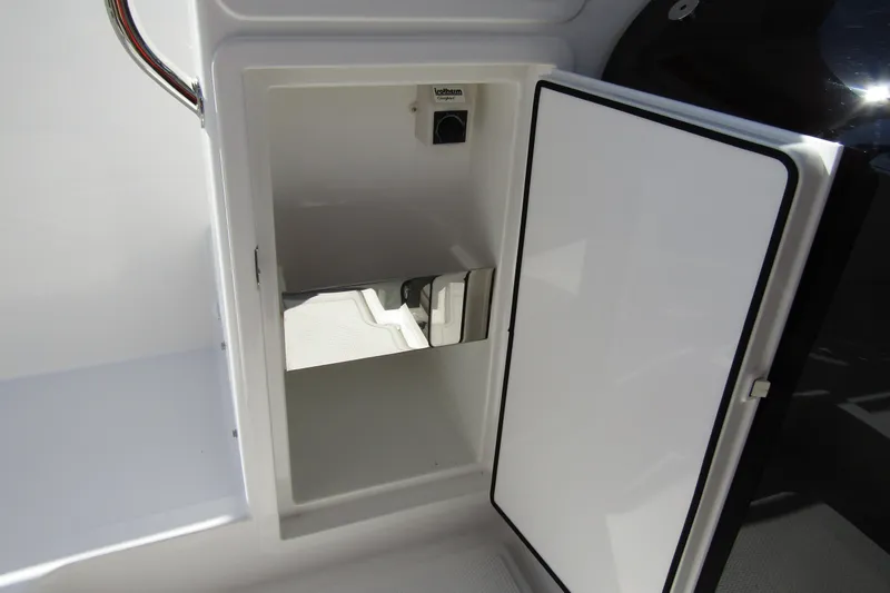 Slide: The Image of Open storage compartment in Nimbus Tender 9 boat, year 2026. - 18