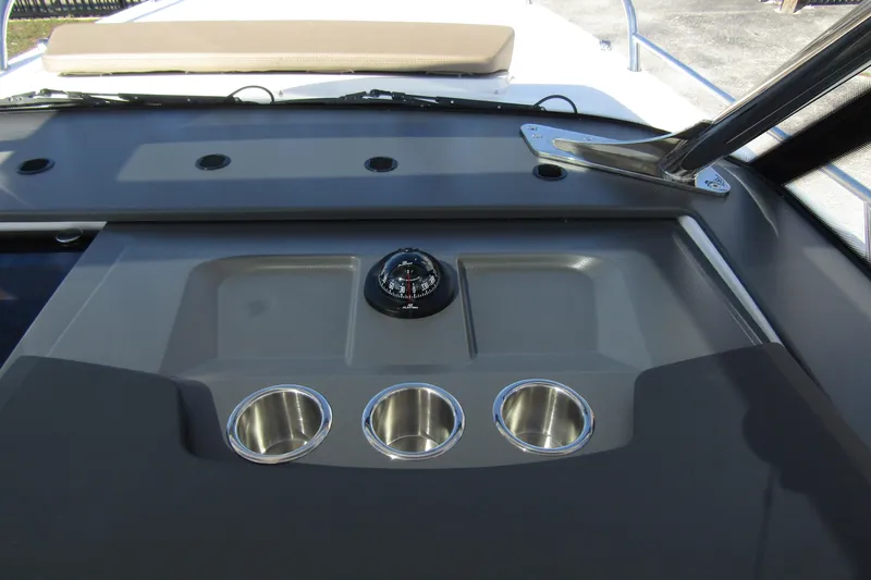 Slide: The Image of Interior view of 2026 Nimbus Tender 9 with compass and cup holders. - 19