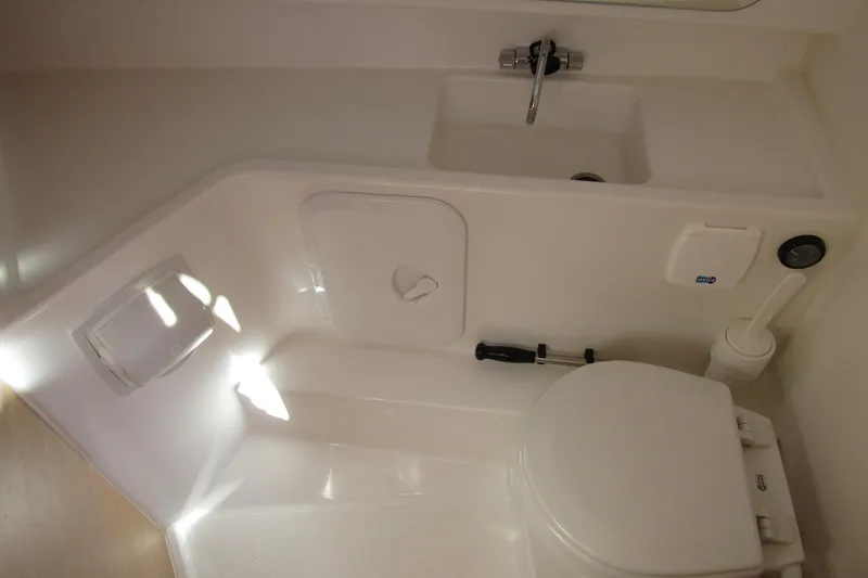 Slide: The Image of Interior of Nimbus Tender 9 Yacht 2026 with toilet and sink. - 26