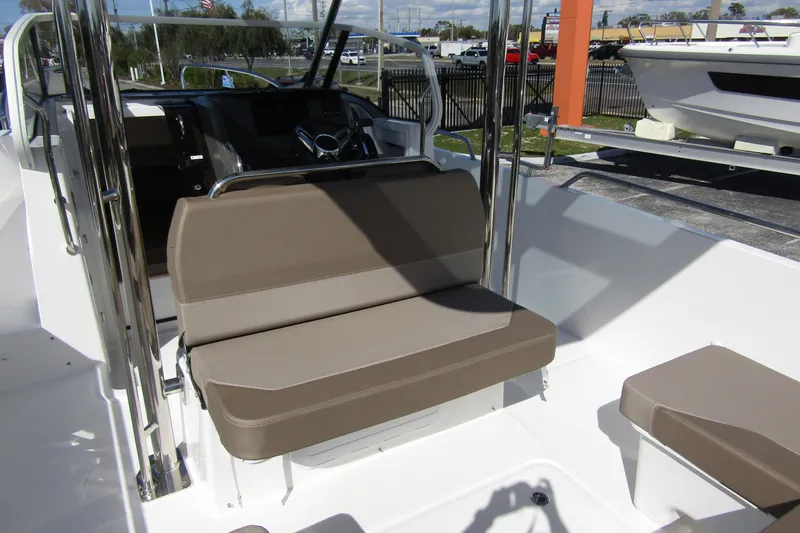 Slide: The Image of Interior of Nimbus Tender 9 boat, 2026 model, featuring beige seating. - 30