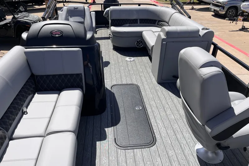 Slide: The Image of 2026 Ranger 223FC boat interior with gray seating and modern design. - 2