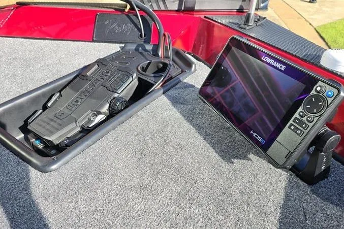 Slide: The Image of 2026 Ranger RT178 boat with Lowrance HDS fishfinder and trolling motor control panel. - 11