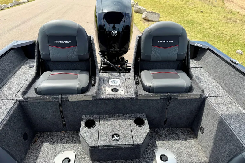Slide: The Image of 2026 Tracker Pro Guide V-175 Combo boat interior with dual seats and motor. - 11