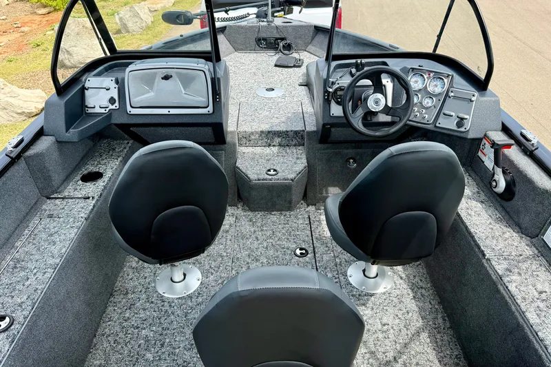 Slide: The Image of Interior of 2026 Tracker Pro Guide V-175 Combo boat with dual seats and steering console. - 6