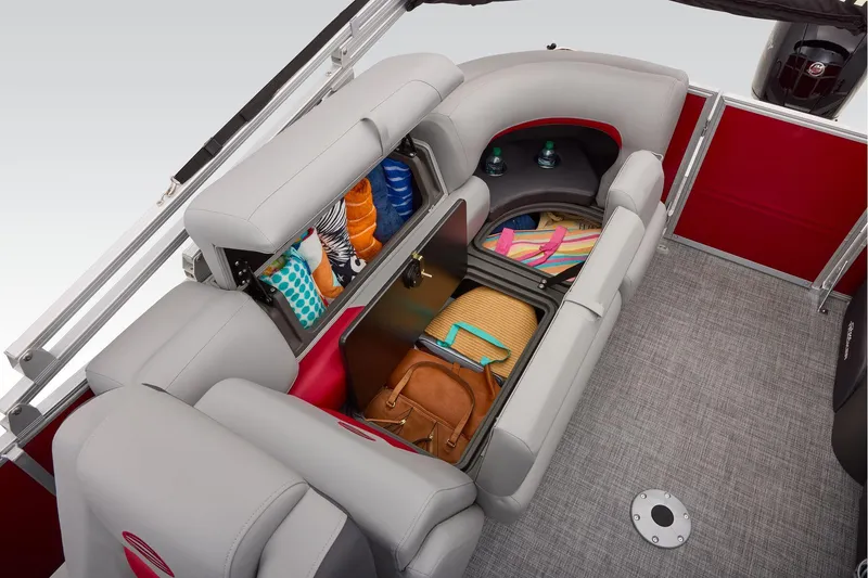 Slide: The Image of 2026 Sun Tracker Party Barge 22 DLX interior with steering wheel and seating. - 64