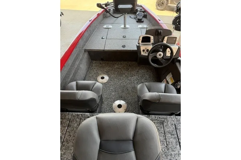 Slide: The Image of 2026 Tracker Pro Team 175 Crappie Edition boat interior with seating and controls. - 8