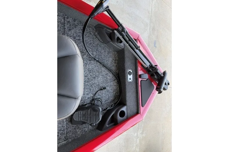 Slide: The Image of 2026 Tracker Pro Team 175 Crappie Edition boat interior with steering and seating. - 6