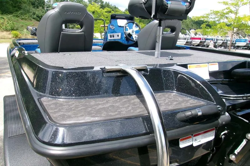 Slide: The Image of 2026 Nitro Z19 XL boat interior with sleek black seating and modern dashboard. - 4