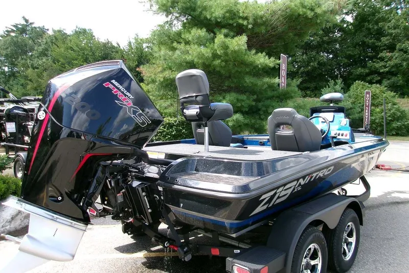 Slide: The Image of 2026 Nitro Z19 XL boat with Mercury Pro XS engine, parked outdoors. - 1