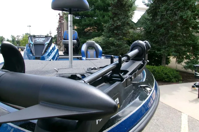 Slide: The Image of 2026 Nitro Z19 XL boat with advanced trolling motor, parked outdoors. - 5