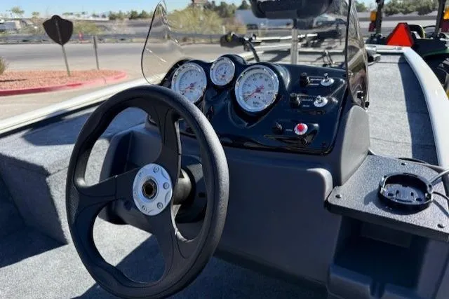 Slide: The Image of Steering console of 2026 Tracker Pro 170 boat with gauges and controls. - 5