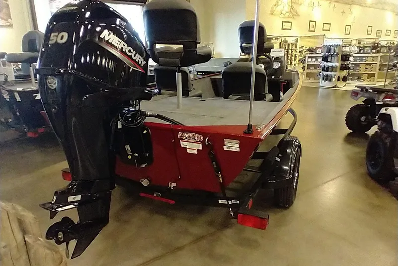 Slide: The Image of 2026 Tracker Bass Tracker Classic XL boat with Mercury 50 engine in showroom. - 5