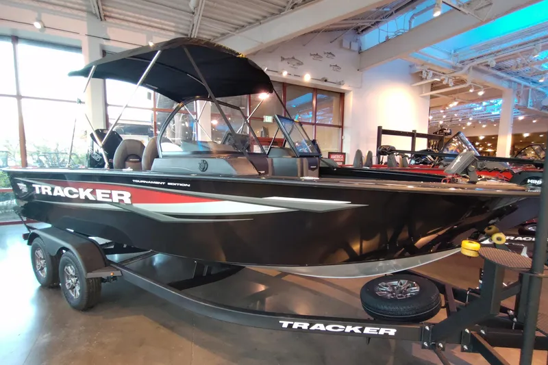 The Image of 2026 Tracker Targa V-19 Combo boat displayed indoors, featuring sleek design and modern features. - 0