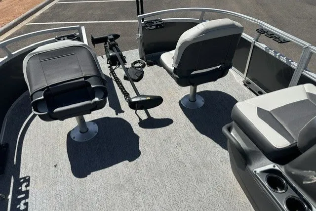 Slide: The Image of 2026 Sun Tracker Bass Buggy 16 XL Select boat interior with seating and fishing equipment. - 20