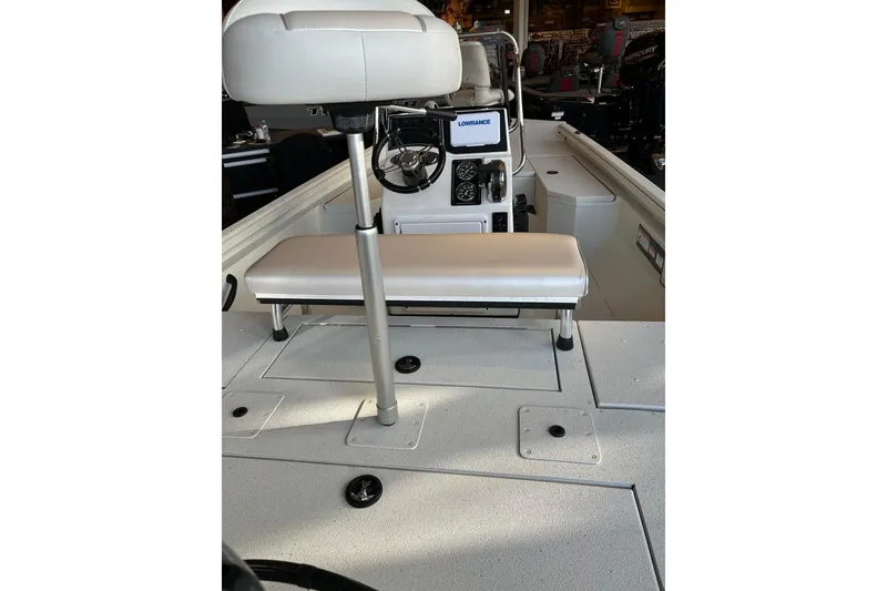 Slide: The Image of 2026 Ranger RB190 boat interior with seating and navigation equipment. - 3