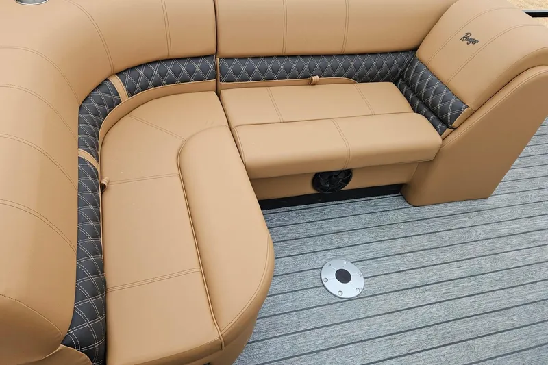Slide: The Image of Luxurious tan seating on 2026 Ranger 220F boat with quilted accents. - 82