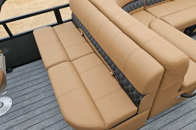 Slide: The Image of 2026 Ranger 220F boat interior with tan leather seating and diamond-patterned accents. - 85