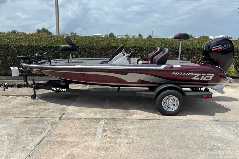 The Image of 2026 Nitro Z18 boat with trailer, featuring sleek design and Mercury Pro XS engine. - 0