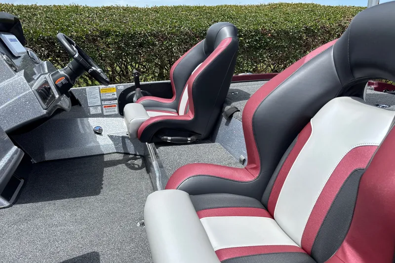 Slide: The Image of Interior of 2026 Nitro Z18 boat with stylish red and gray seating. - 17