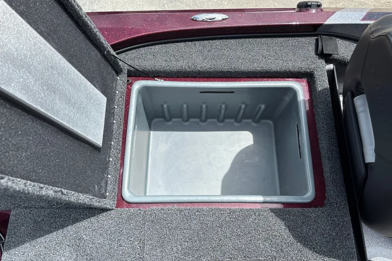 Slide: The Image of Open storage compartment in 2026 Nitro Z18 boat, featuring a spacious interior. - 28