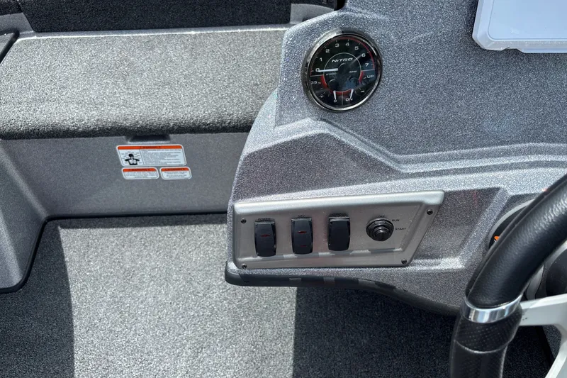 Slide: The Image of Dashboard of a 2026 Nitro Z18 boat with gauges and controls. - 15