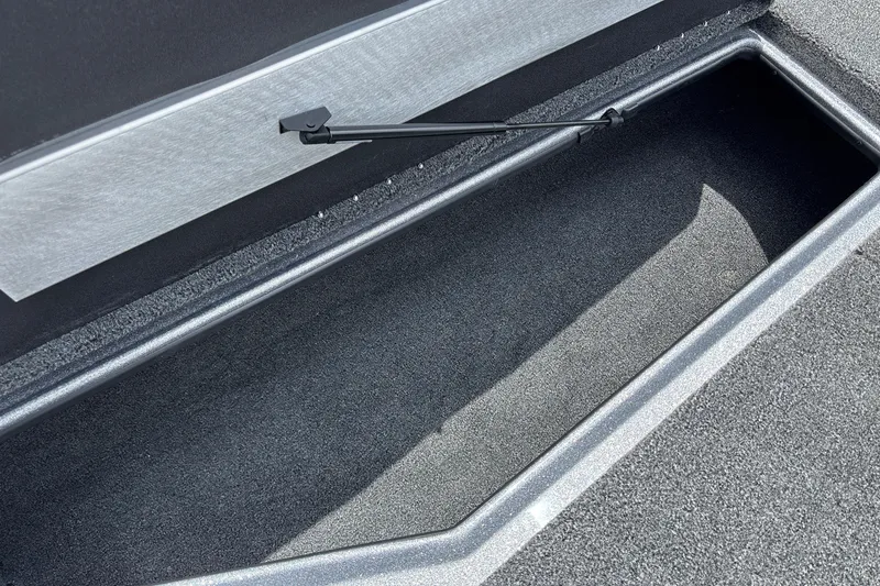 Slide: The Image of Storage compartment of 2026 Nitro Z18 boat, featuring a sleek, carpeted interior design. - 22