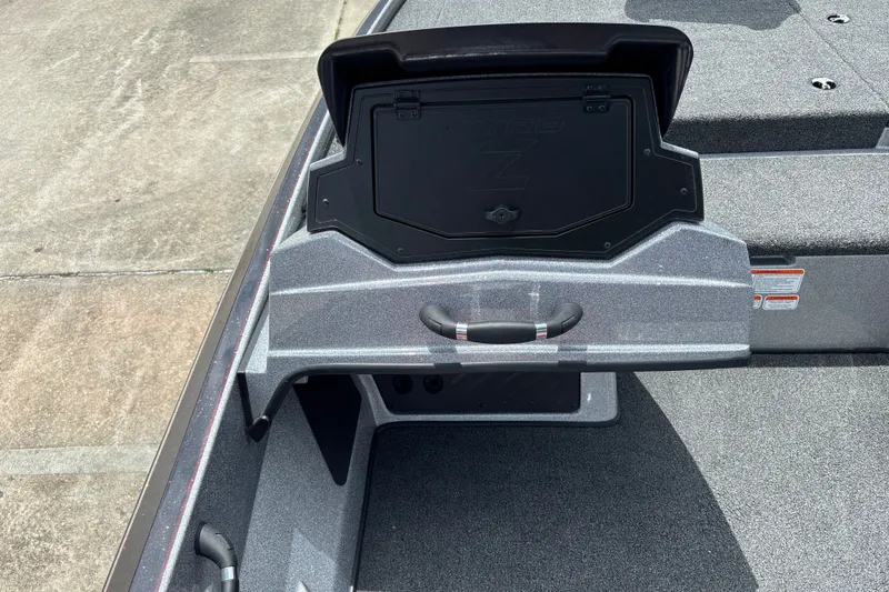 Slide: The Image of 2026 Nitro Z18 boat deck with storage compartment open, showcasing sleek design and functionality. - 19