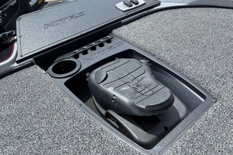 Slide: The Image of 2026 Nitro Z18 boat deck with pedal and storage compartment. - 10