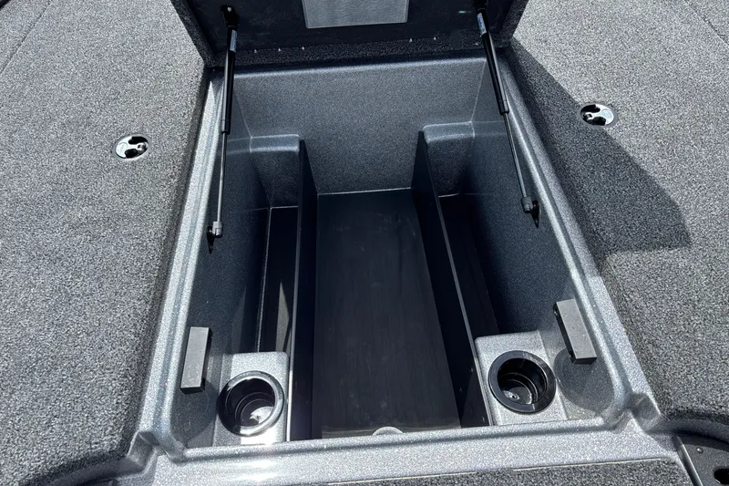 Slide: The Image of Open storage compartment of 2026 Nitro Z18 boat, showcasing spacious interior design. - 21