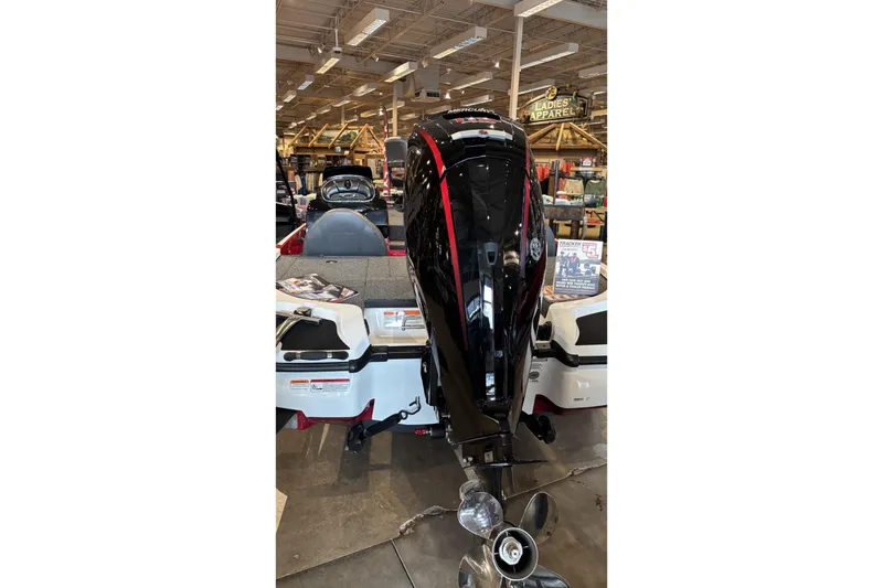 Slide: The Image of 2026 Nitro Z17 boat with Mercury outboard motor displayed in a showroom. - 1