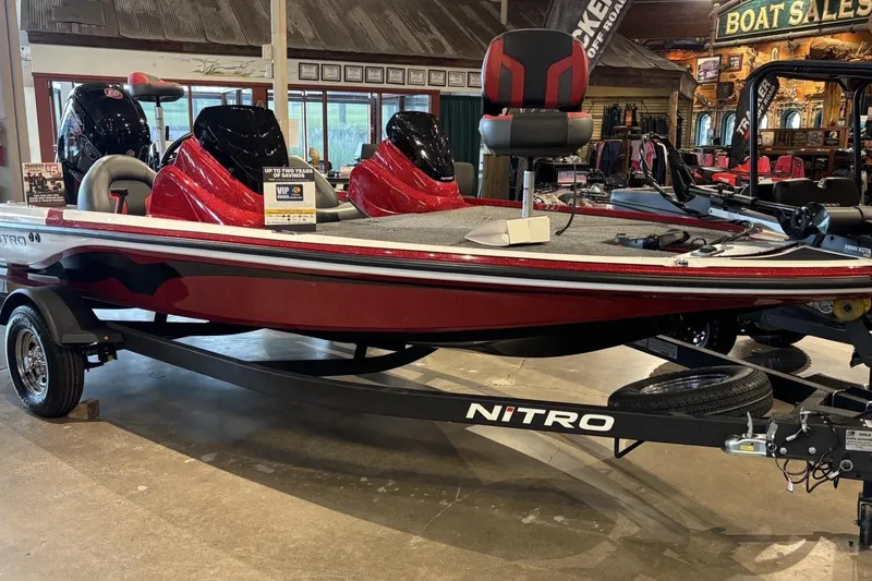 The Image of 2026 Nitro Z17 boat in showroom, featuring sleek red design and modern seating. - 0